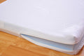 Lit bébé avec matelas mousse aloe vera barrière réglable transformable enfant
