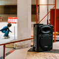 Enceinte portable 12 pouces 700W avec 2 micros télécommande housse Bluetooth USB SD autonomie 5 à 7h